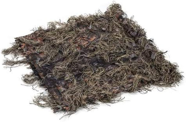 Waterfowl hunting camo netting draped over a duck blind in marsh cover