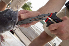 Bent nose fishing pliers with line cutter