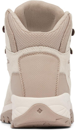 Columbia Women's Newton Ridge Plus waterproof hiking boot with rugged outsole and padded collar for outdoor trekking.