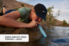 LifeStraw personal water filter for hiking, camping, and travel, showing the compact hydration gear with straw design and filter components.