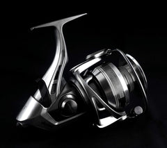 Okuma Coronado CDX lightweight baitfeeder saltwater reel with spool and handle, designed for saltwater fishing.