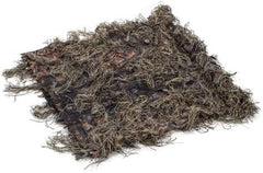 Waterfowl hunting camo netting draped over a duck blind in marsh cover